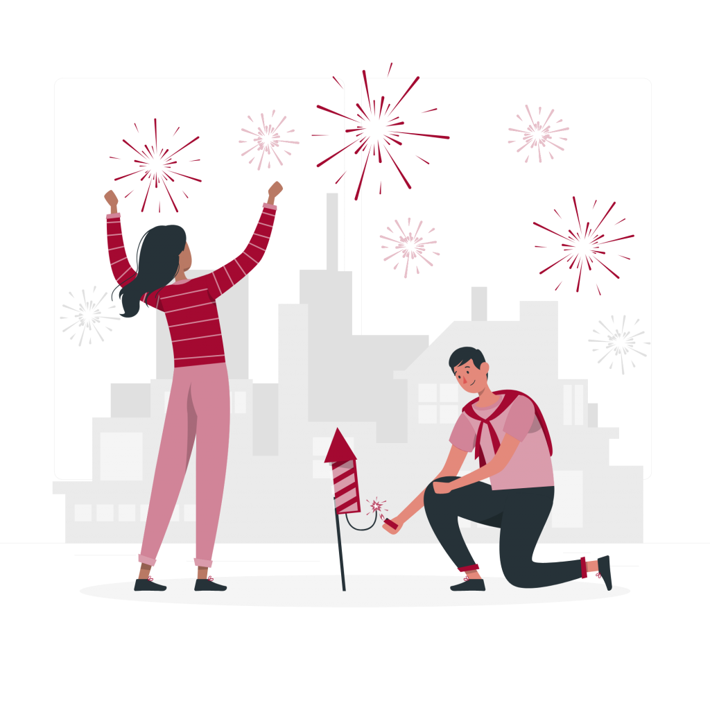 Zwei Personen zünden in einer Stadtumgebung Feuerwerk: Eine Frau steht mit erhobenen Armen, während ein kniender Mann eine Rakete anzündet.